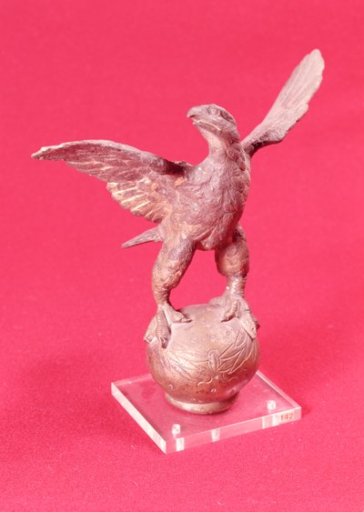 Eagle with spread wings on a ball by Roman